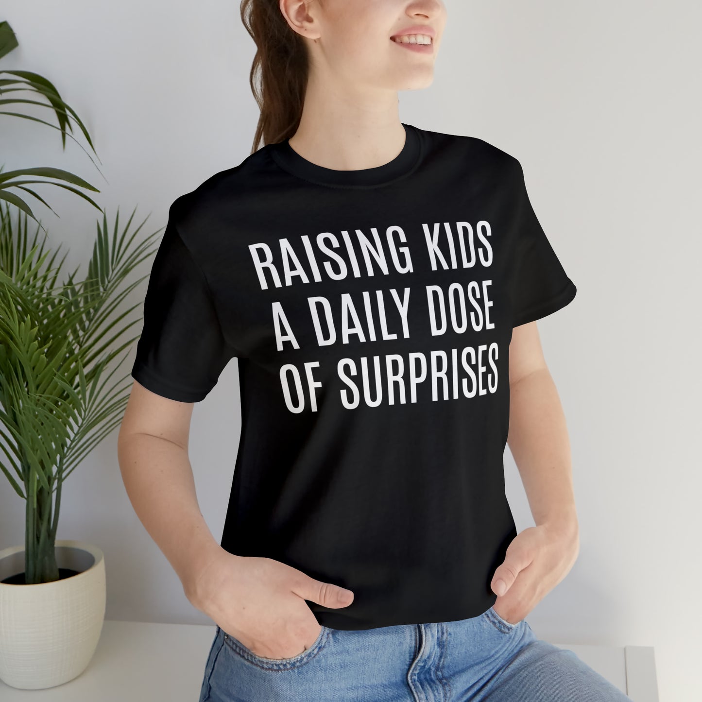 Raising Kids Daily Surprises - T-Shirt - Cool Father’s Day Shirt - Funny Dad Shirt - Father Figure Shirt - Mom - Mothers - Entrepreneur - Parenting