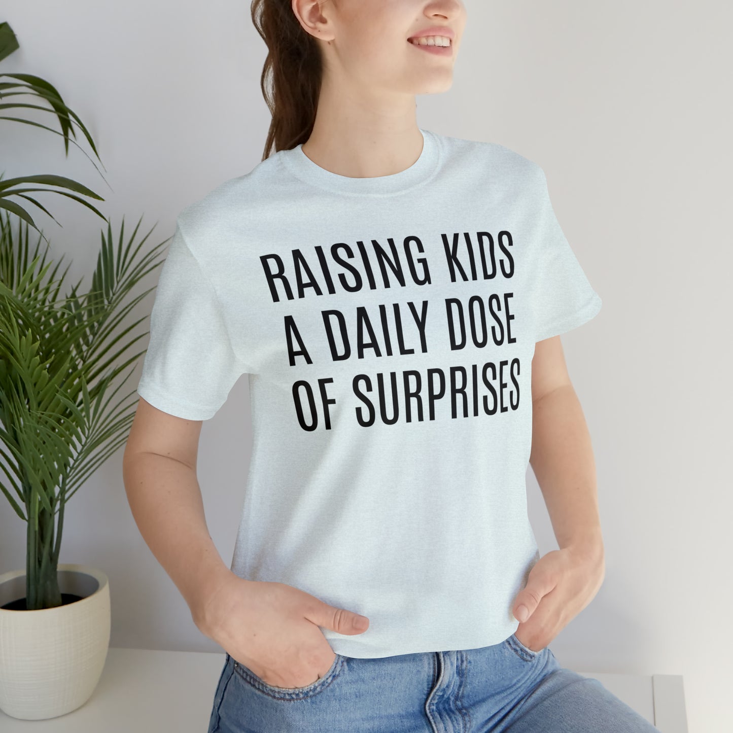 Raising Kids Daily Surprises - T-Shirt - Cool Father’s Day Shirt - Funny Dad Shirt - Father Figure Shirt - Mom - Mothers - Entrepreneur - Parenting