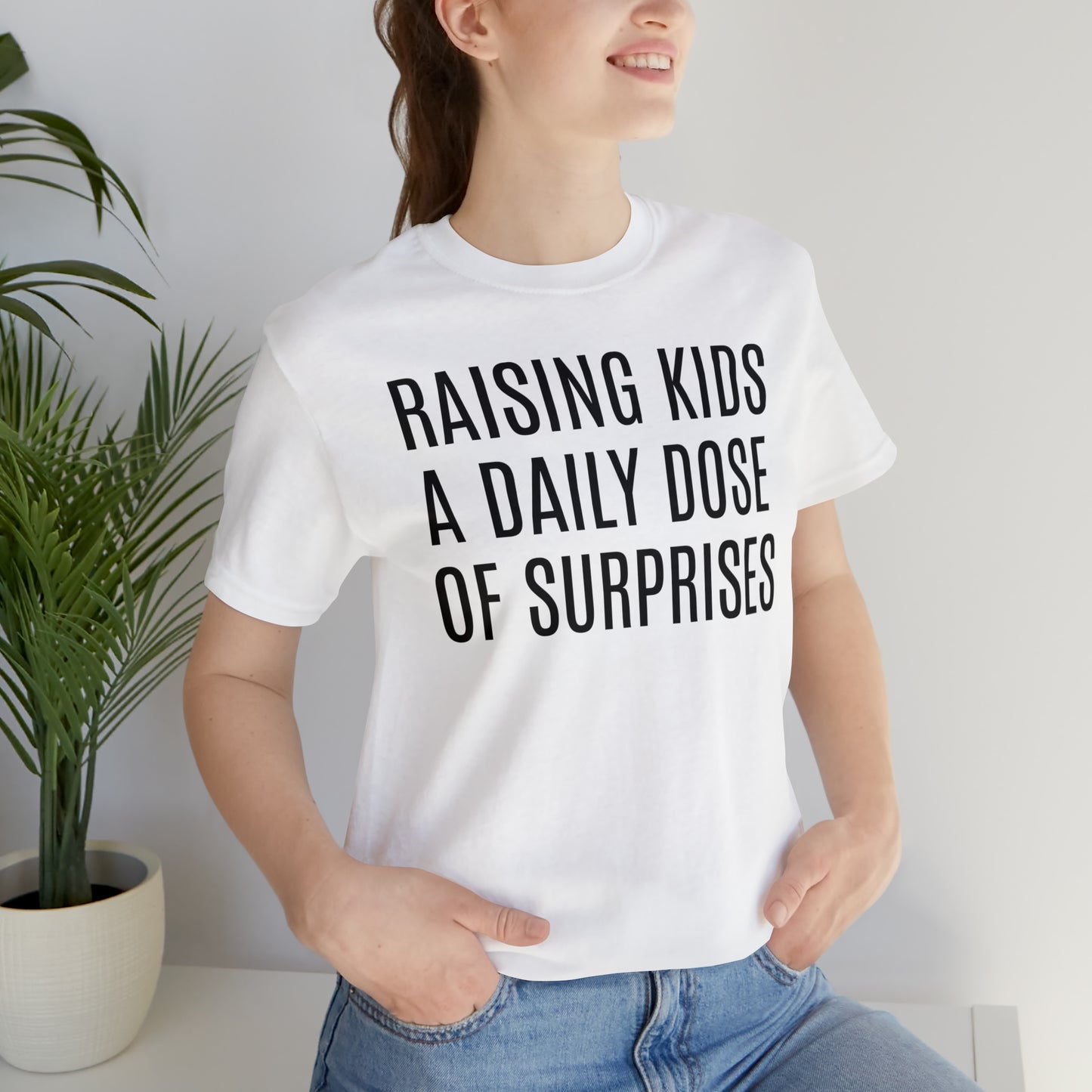 Raising Kids Daily Surprises - T-Shirt - Cool Father’s Day Shirt - Funny Dad Shirt - Father Figure Shirt - Mom - Mothers - Entrepreneur - Parenting